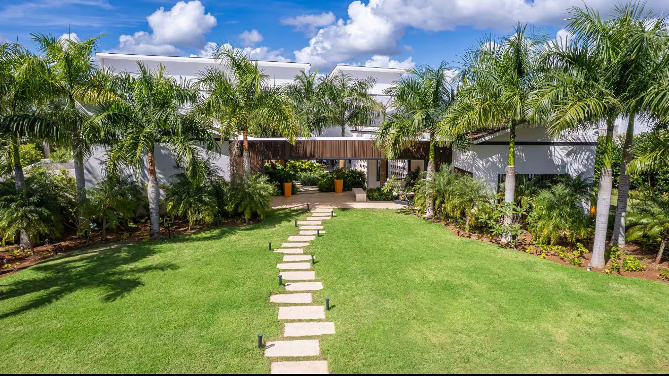 Garden lawn and stepping-stone path at 5BR Vista Lagos 16