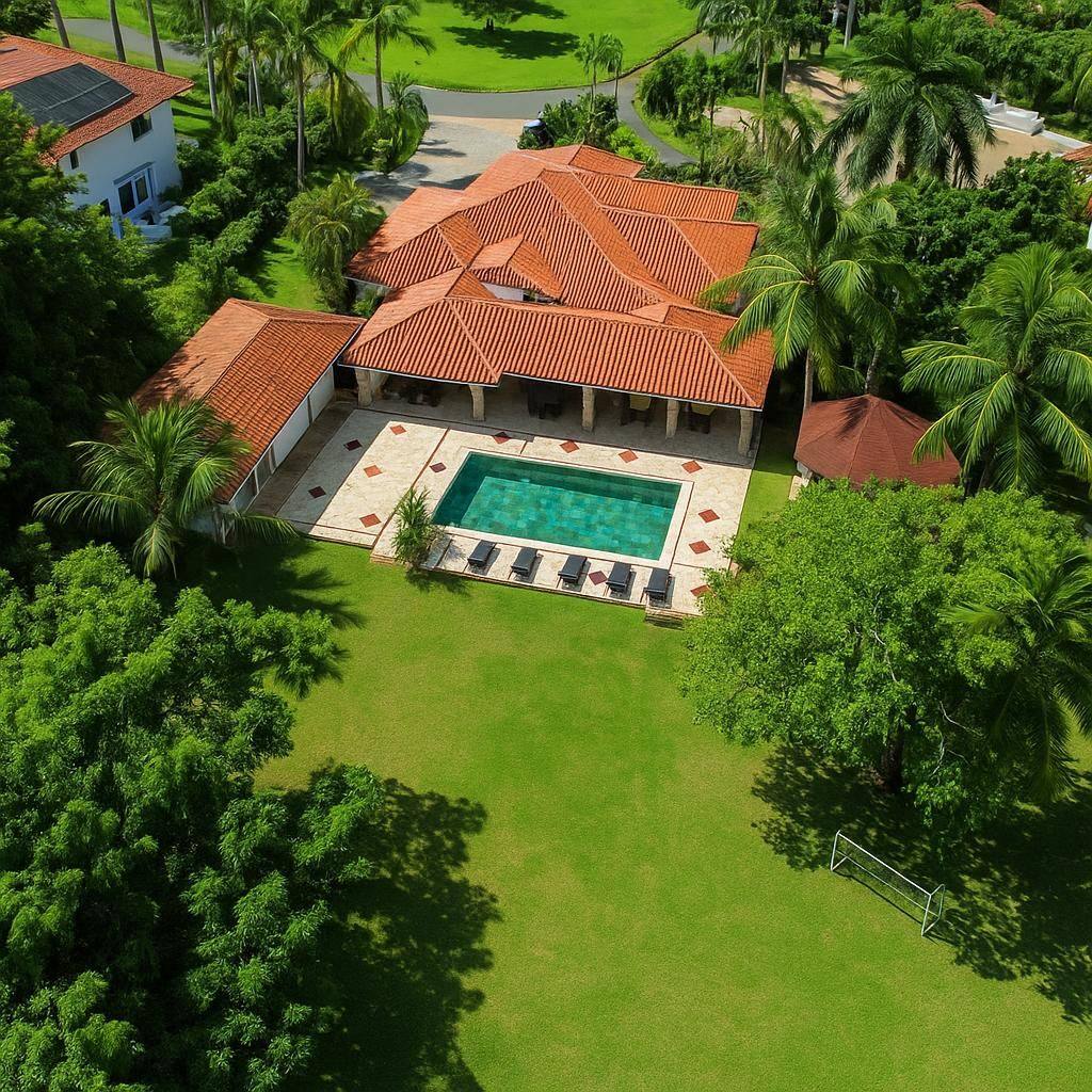 Aerial view of 5BR Cajuiles Garden Villa — villa, pool and lawns, Casa de Campo
