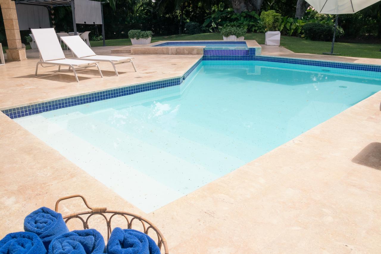 Private pool with loungers at Fairway Golf Estate