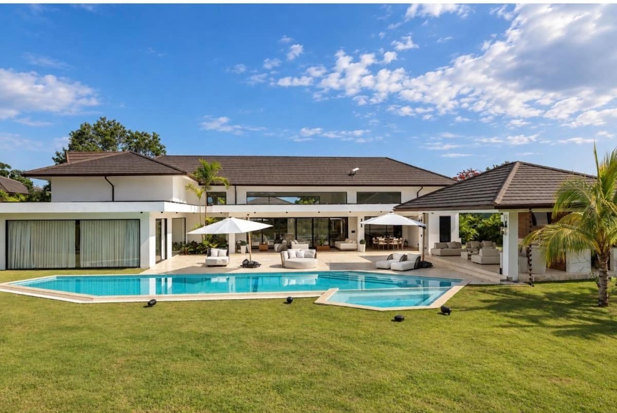 The villa seen from the lawn across its pool, La Vereda Pool Villa, Casa de Campo