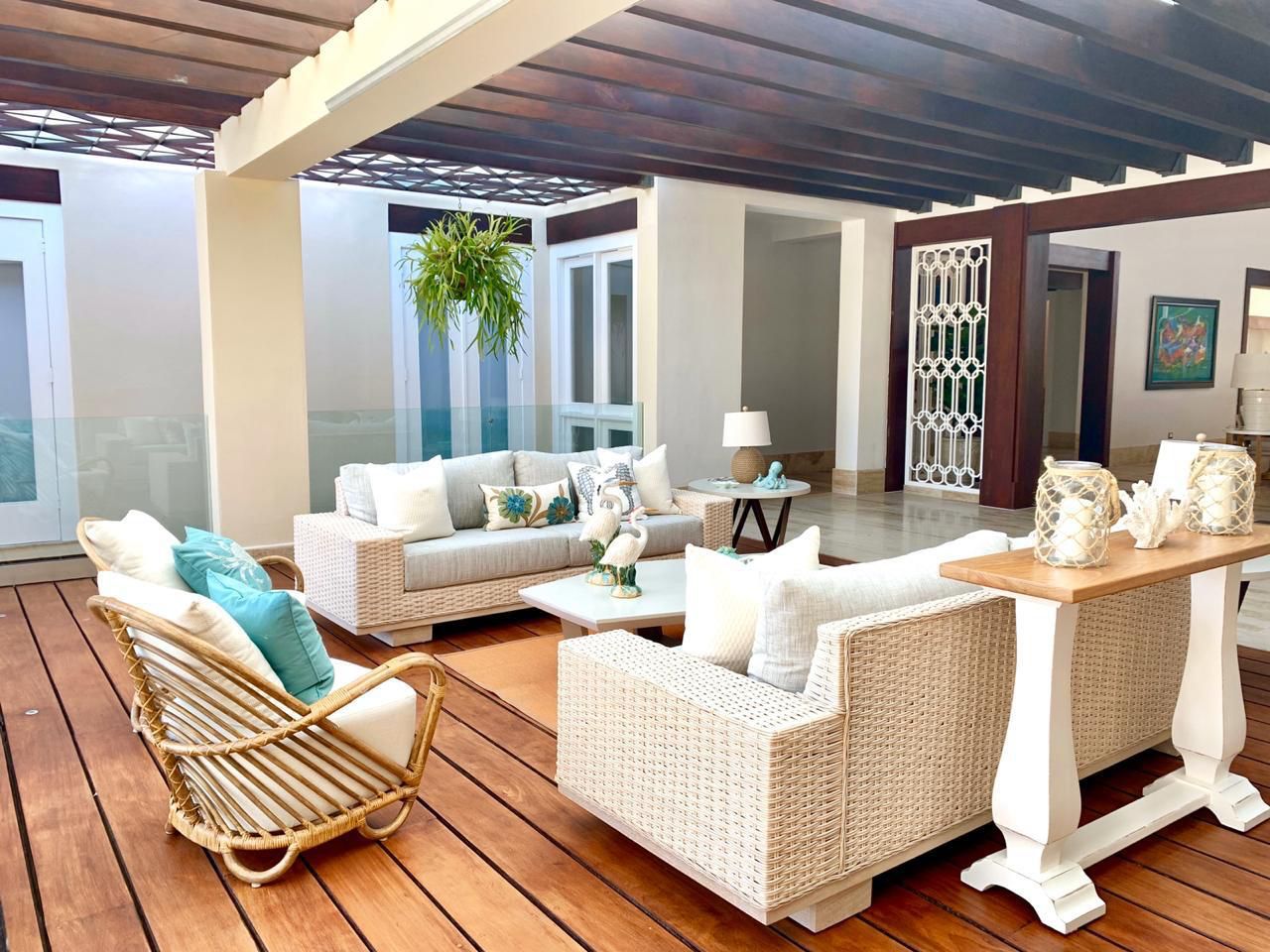 Covered terrace lounge at the 7BR Las Lomas Villa