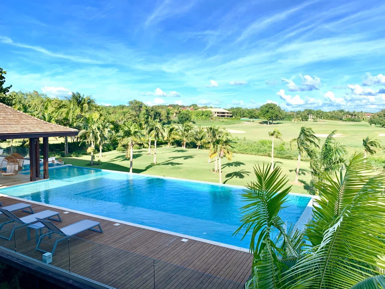 Infinity pool overlooking the golf course at the 7BR Las Lomas Villa