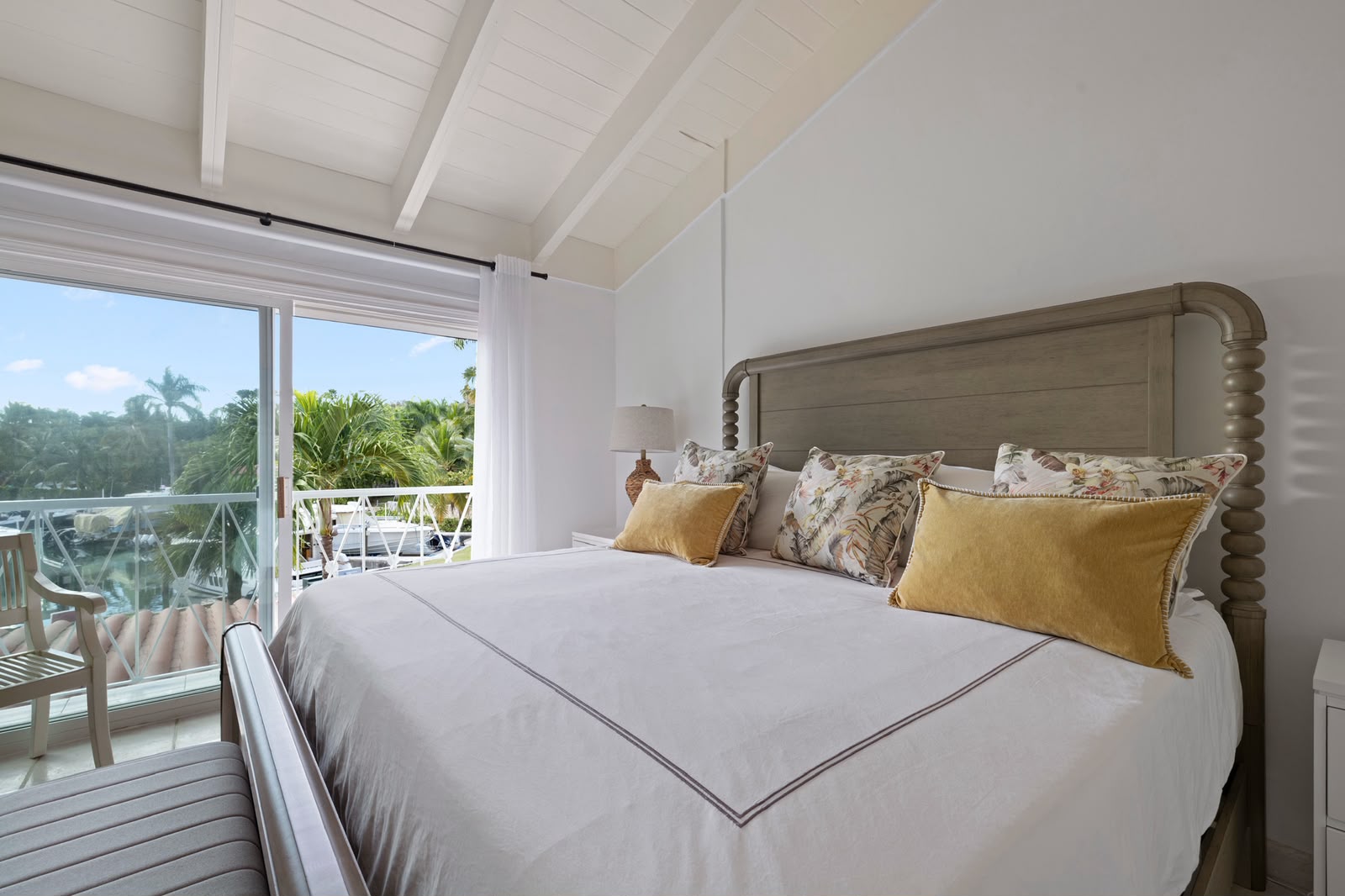 Primary bedroom with marina view at the Darsena Marina townhouse