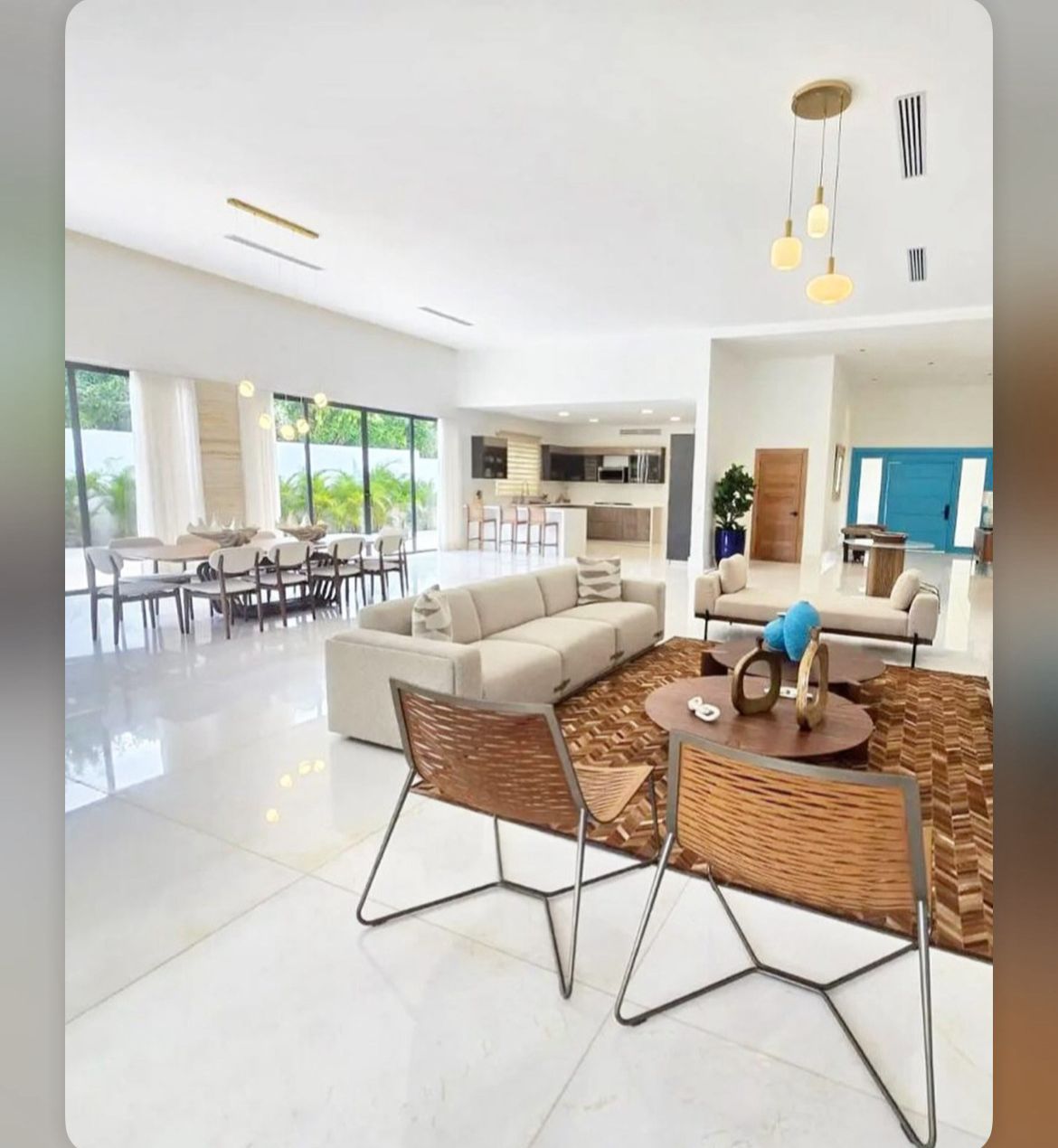 Open-plan living, dining and kitchen at 5BR Los Lagos Contemporary Estate