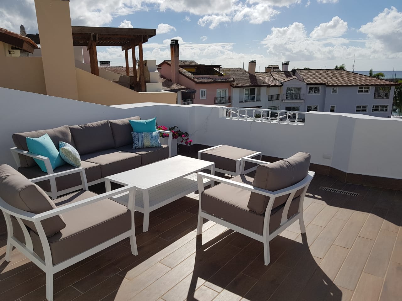 Private rooftop terrace with lounge seating at Marina Apartment with Roof Terrace