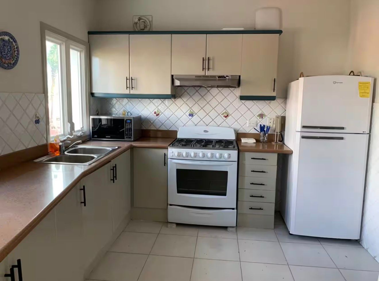 Fully equipped kitchen at the 4BR Marina Apartment