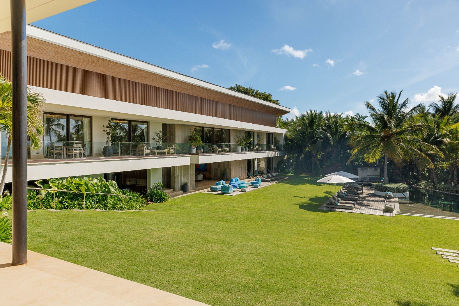 Two-storey facade and lawn at Punta Águila, Casa de Campo