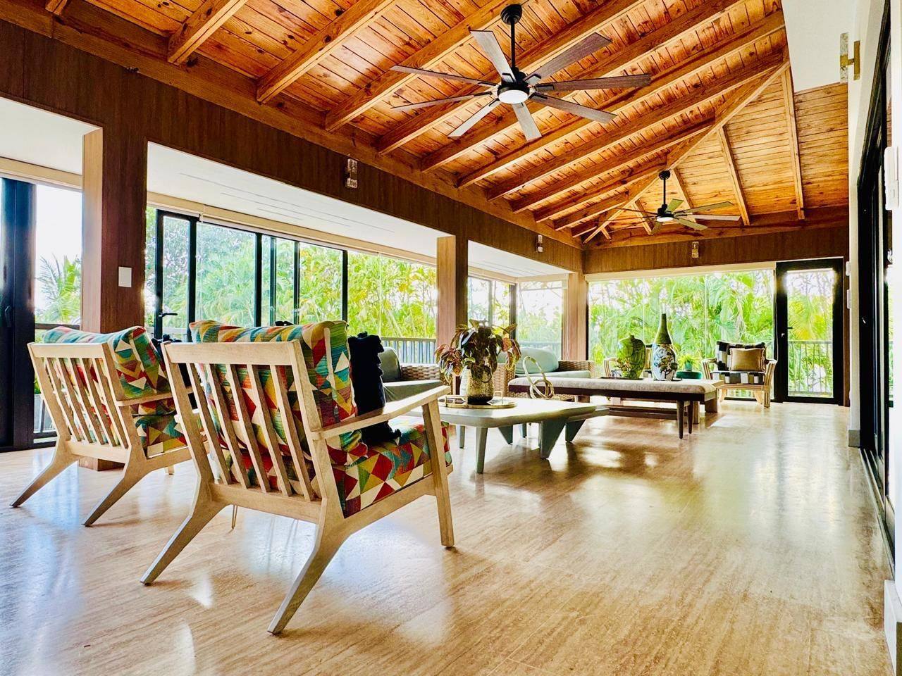 Open-plan living under timber ceilings at 5BR Vivero Tropical Villa